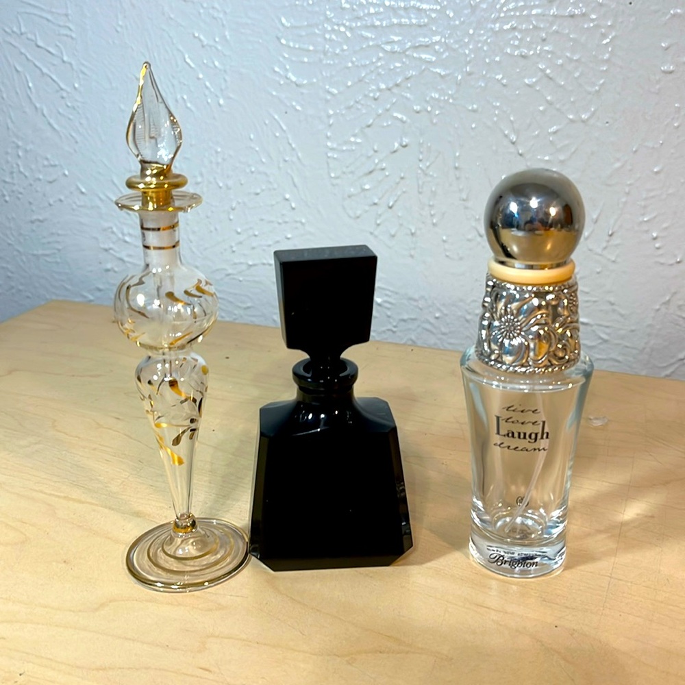 Three very nice empty perfume bottles